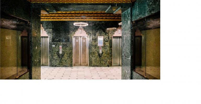 The Art Deco-style lobby elevators at The Sinclair hotel in Fort Worth, Texas