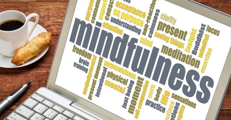 Mindfulness word cloud on laptop