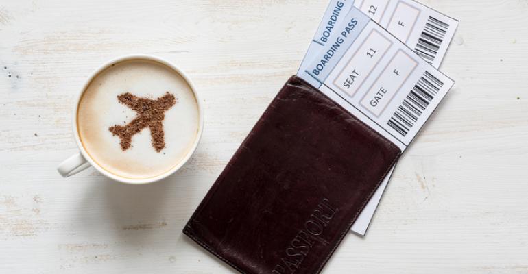 Capuccino cup with boarding passes