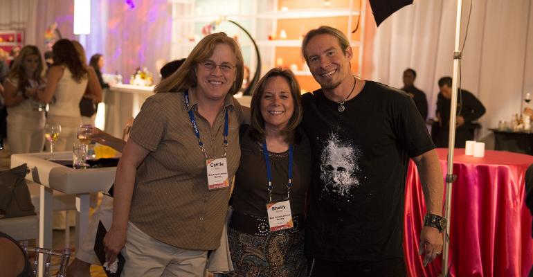 Left to right Cathie Myers and Shelly Sichta with Best Friends Animal Society share a moment with opening general session speaker artist and author Eric Wahl