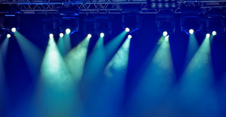 Spotlights on a hazy stage