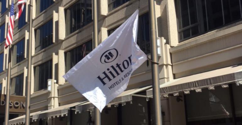 Team Members join General Manager Paolo Pedrazzini to raise the Hilton flag and welcome The Madison Washington DC, a Hilton Hotel to the portfolio of 14 brands.