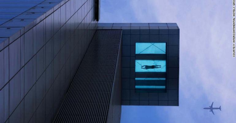 Glass-bottomed high-rise swimming pool–yikes! 