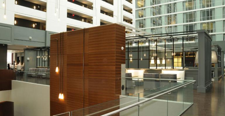 The atrium at the Hilton Columbus Downtown is flooded with natural light