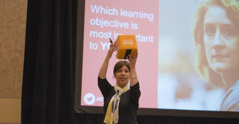 Donna Kastner director exposponsor sales and activation Velvet Chainsaw Consulting tossing a Catchbox mic to an attendee of her session on sponsorship at  Cventrsquos Association Meetings Summit in Las Vegas June 18ndash20