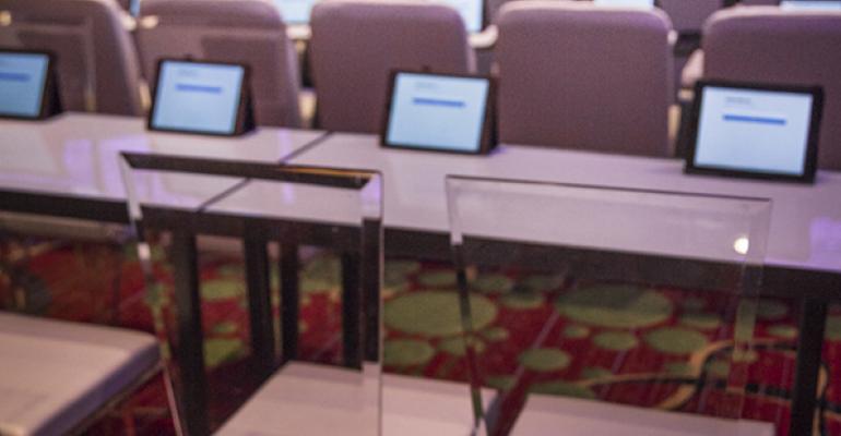 hotel ballroom with ipads at each seat