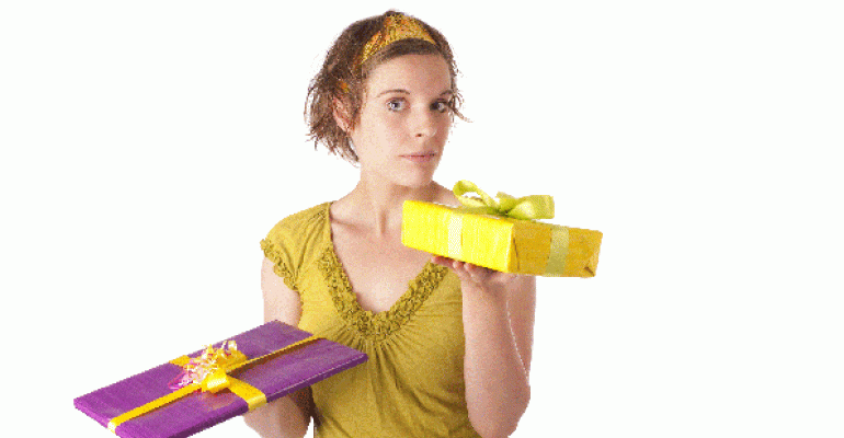 Woman holding up two gift boxes