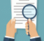 Cartoon contract under a magnifying glass