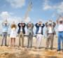 Margaritaville execs raise their fins at the groundbreaking of the new Orlando resort