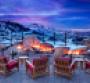 Mountain Terrace at St Regis Deer Valley guests can warm themselves at the fire pit while catching spectacular Wasatch Mountain views