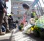 People leave flowers and flags to honor those injured and killed by the Boston Marathon bombing