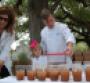 New Orleans chef Dominique Macquet serving mintinfused iced tea with his wife Wendy and daughter Nadya at a local event will be one of the experts participating in the Morial39s Farm to Table symposium