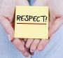 Hands holding PostIt saying Respect