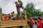 Texas Guardsmen evacuate Houston residents after Hurricane Harvey.