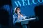 Female speaker at podium