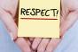 Hands holding PostIt saying Respect