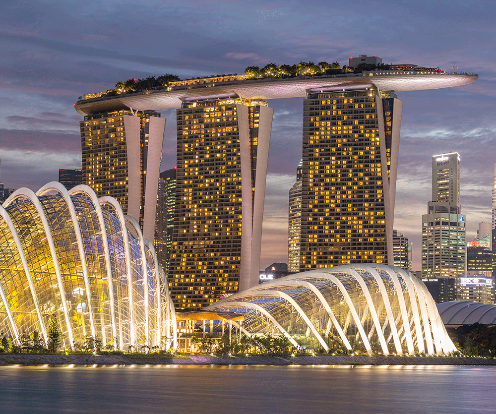 The Marina Bay Sands towers, connected by rooftop patio 55 stories high.
