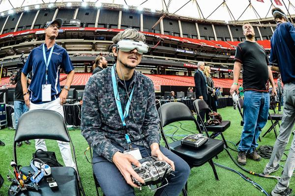 F3Expo participant pilots a drone in the Georgia Dome.